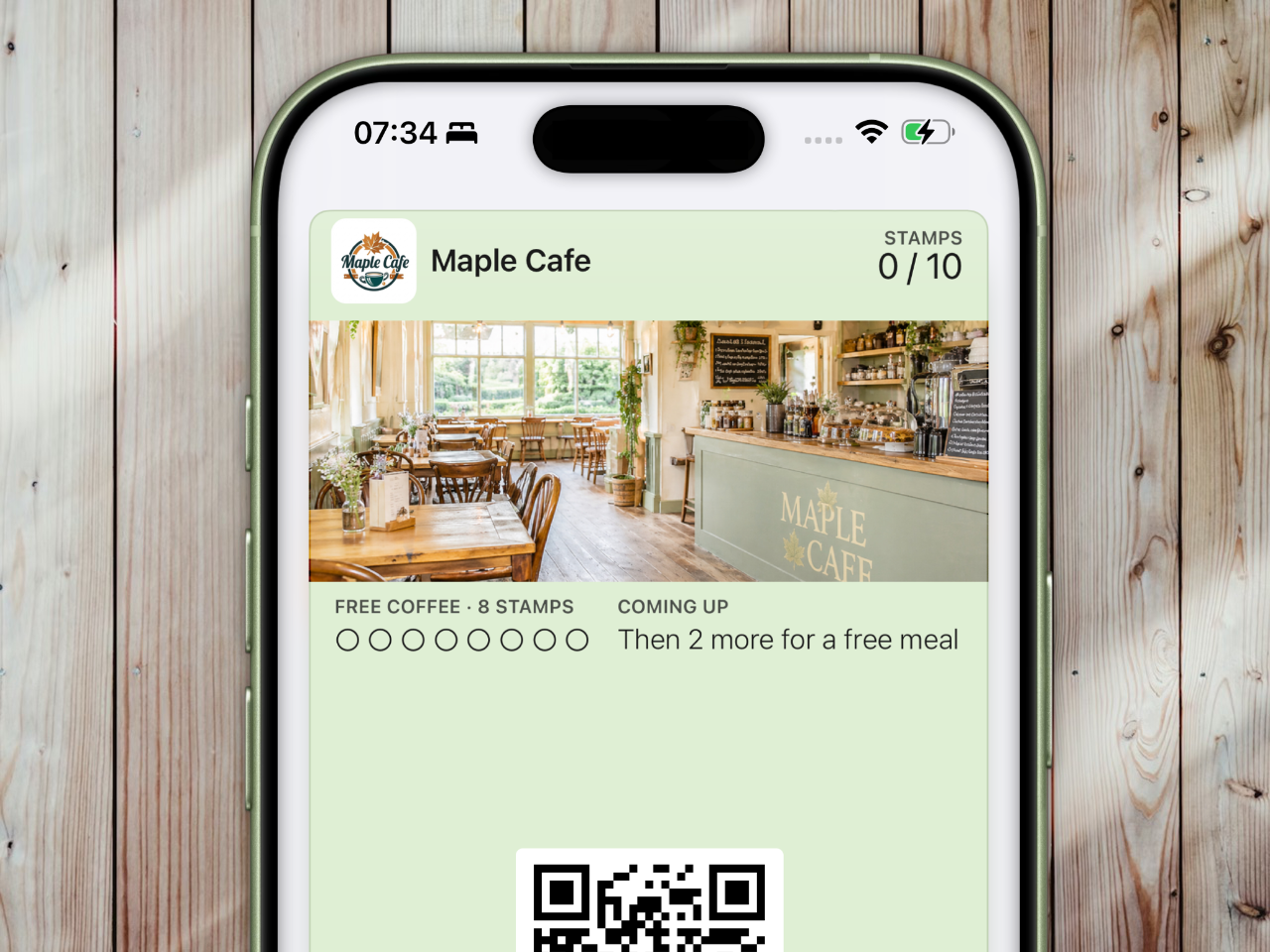 iPhone showing Candour loyalty stamp card with Apple Wallet pass
